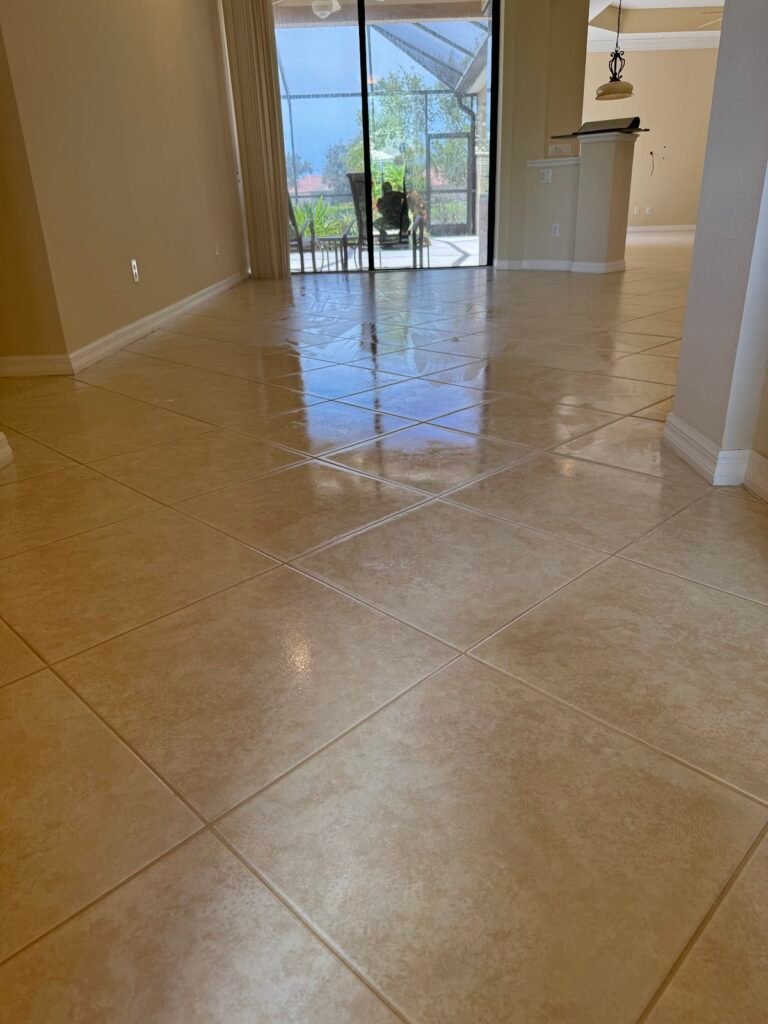 Glossy tile floor after restoration and sealing in a Florida home